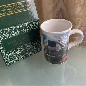 Thomas Kinkade mug  It lights up when filled with hot liquids